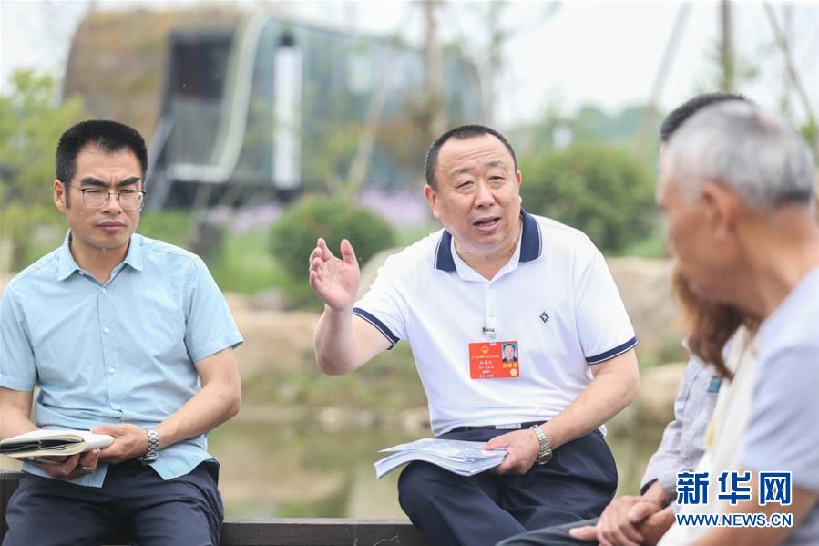 （新華全媒頭條·兩會精神看落實·圖文互動）（2）整體謀劃、系統(tǒng)升級、全面提升——落實全國兩會精神織牢織密公共衛(wèi)生防護網(wǎng)